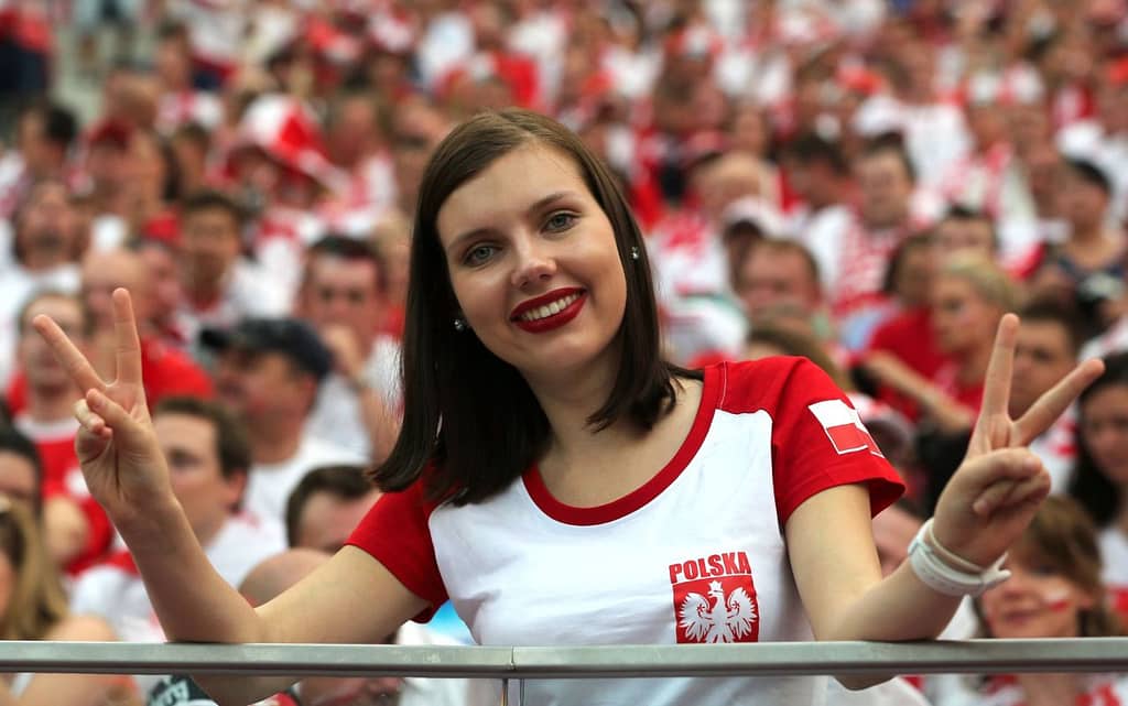 Image of a student in Poland at a soccer game